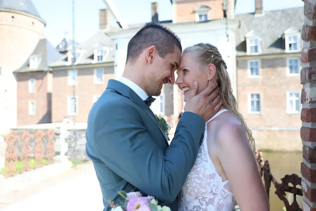 Hochzeitsreportage Hochzeitsfotograf Brautpaar Wasserschloss Anholt